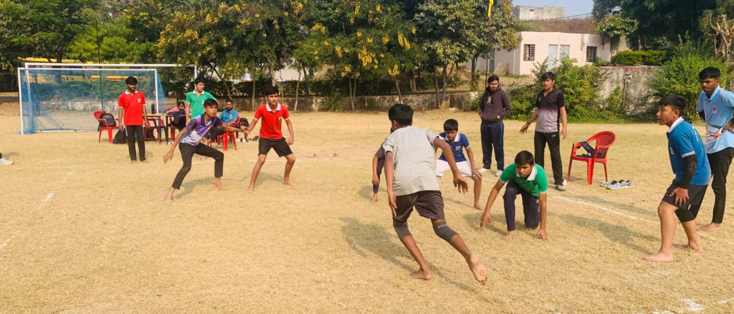 Sports Ground & Courts: Outdoor sports facilities including cricket, football, basketball, athletics and yoga areas for physical fitness.